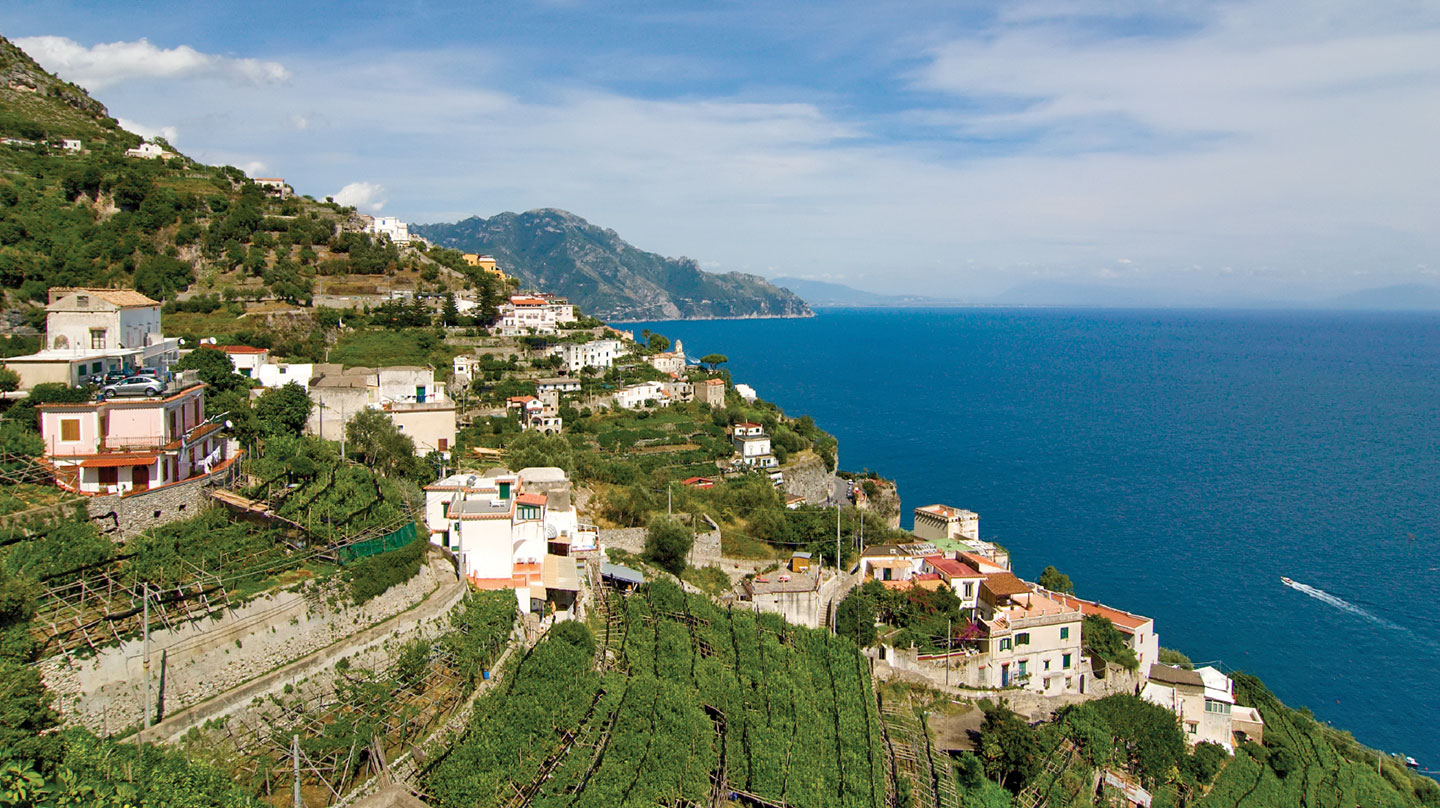 Green hillside of the Amalfi coast looking out to sea