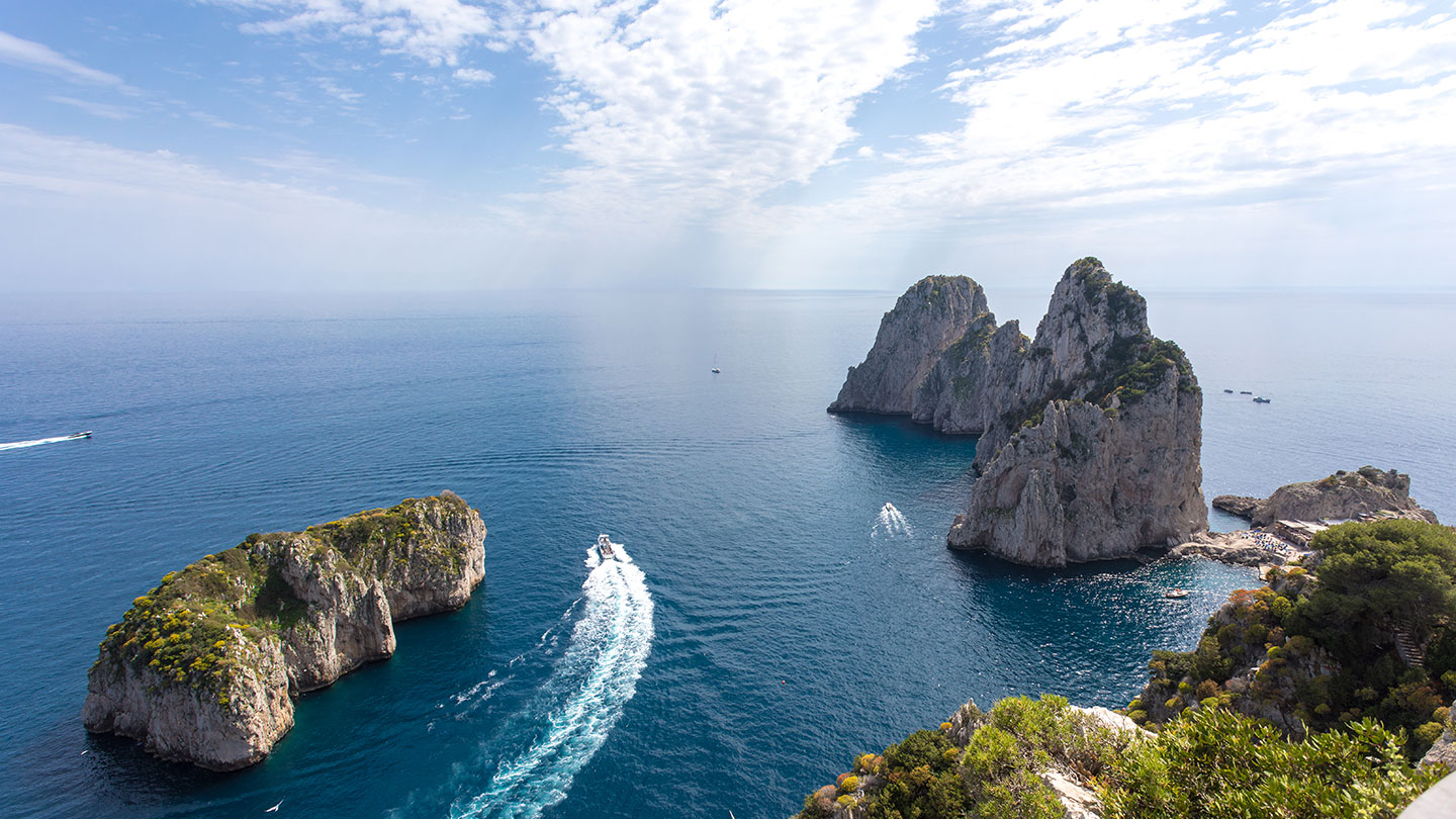 Capri ferry sailing on the coast of the Bay of Naples