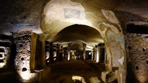 Dim caves of Catacombe di San Gennaro