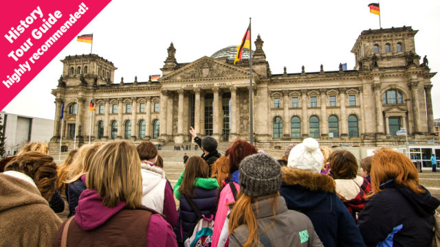 A tour guide accompanying a school history trip to Berlin