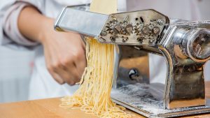 Authentic hand turned pasta making machine in Italy