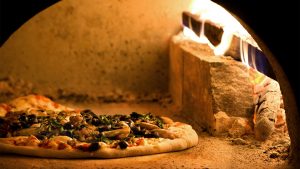 Authentic italian pizza being stone baked