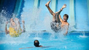 Young man enjoying the water slides of Valle dell'Orso Water Park