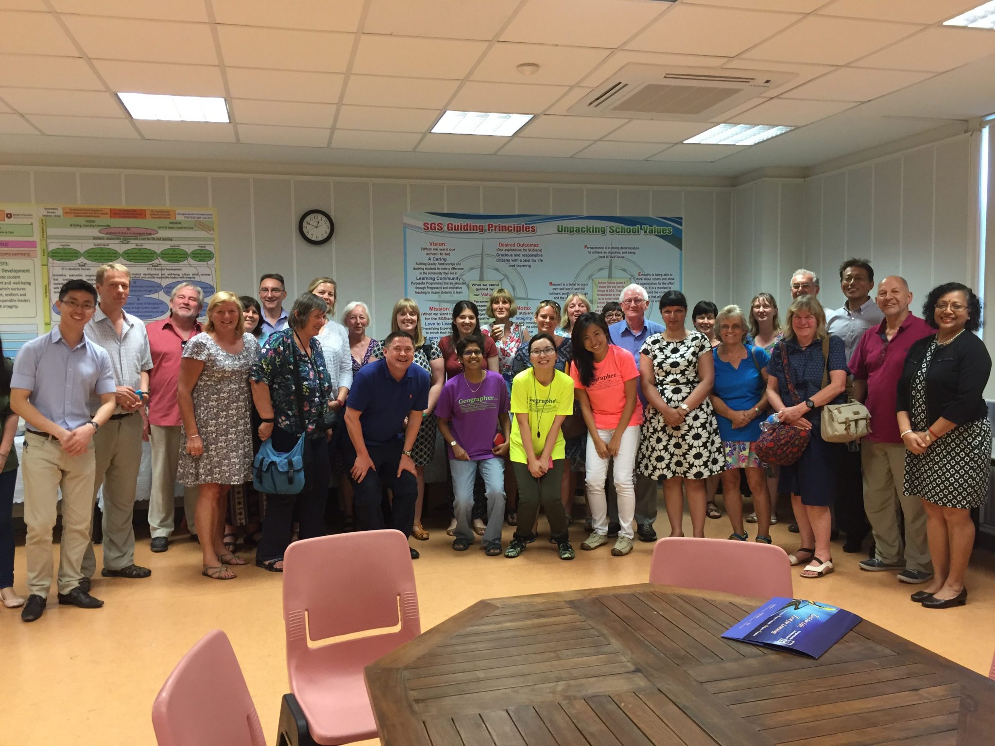 Members of the GA tour meeting teachers from Serangoon Garden School