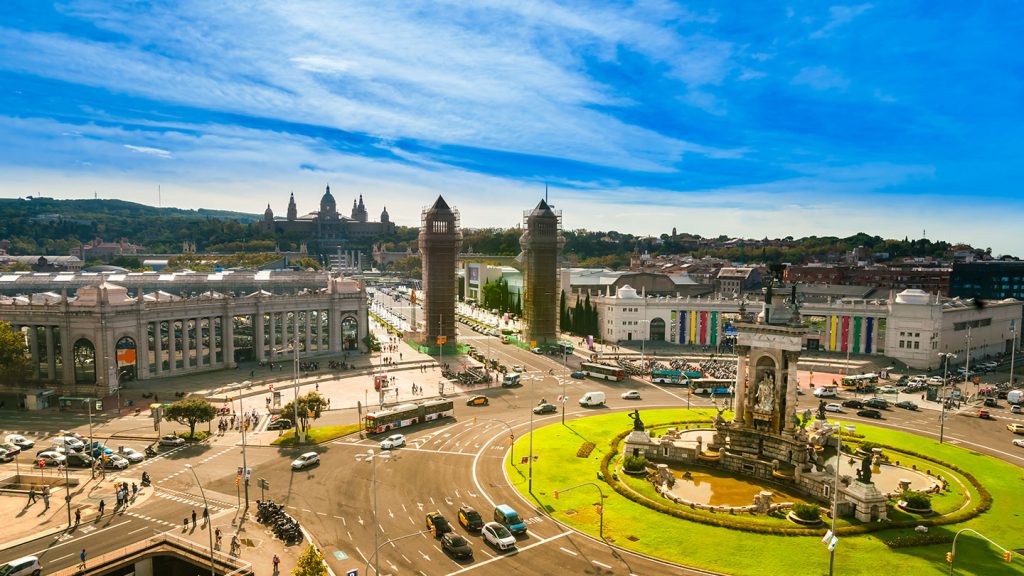 The busy Placa d'Espanya on a sunny day in Barcelona