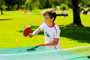 http://www.dreamstime.com/stock-photography-boy-playing-table-tennis-park-image7219972