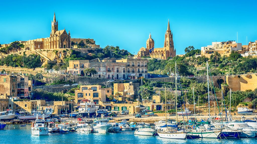 Landscape shot of Gozo, Malta, with the marina in the foreground.