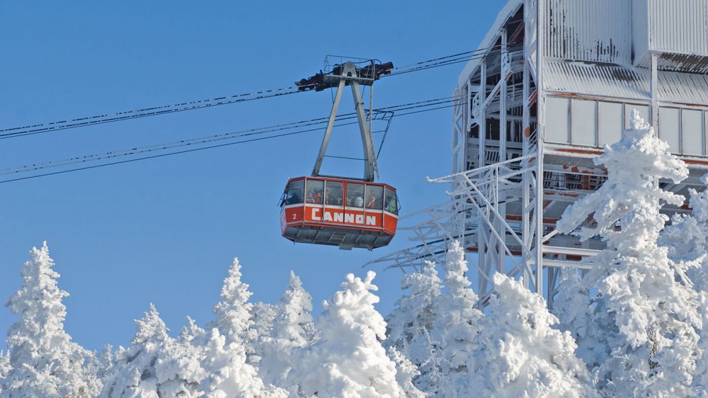 The red ski lift amongst the white snow of Cannon