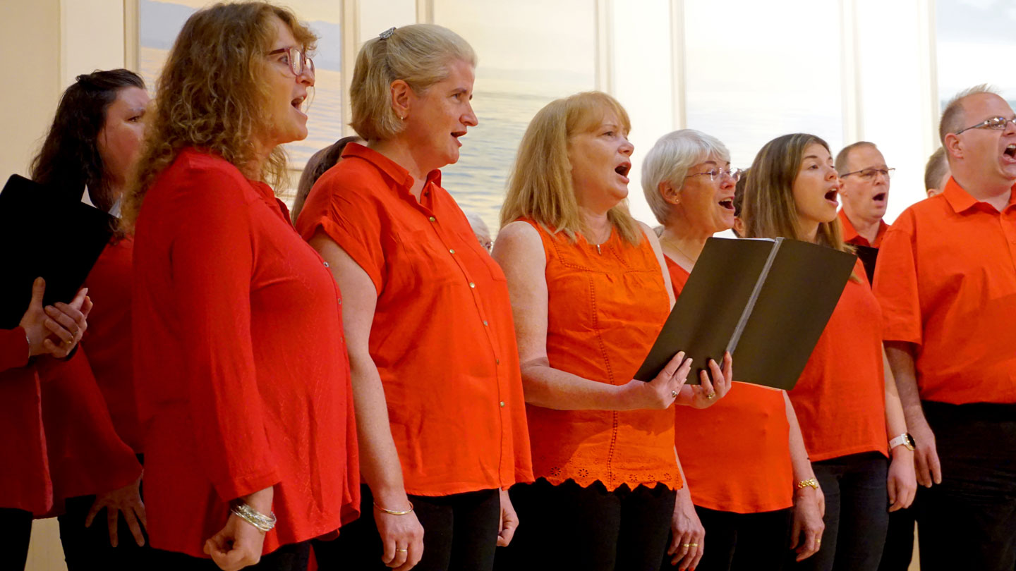 Take Note Community Choir performing at Stockbridge Church on a concert tour