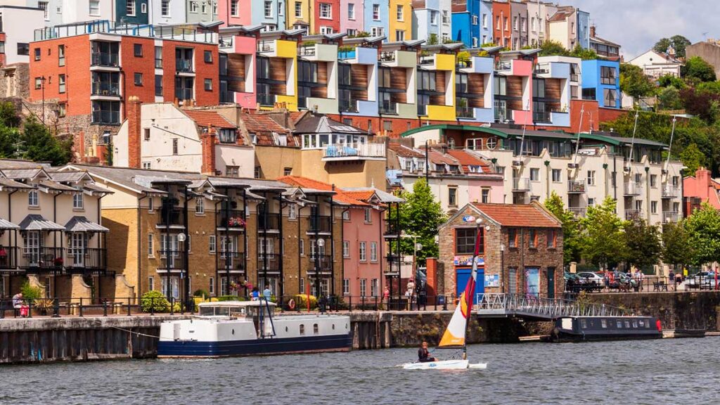 Harbour Waterfront in Bristol, UK. Colourful buildings on the waterfront in Bristol harbour on a sunny day. England, UK.