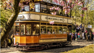Crich Tramway Museum. A restored Glasgow tram traverses the main street at the National Tramway Museum at Crich in Derbyshire.