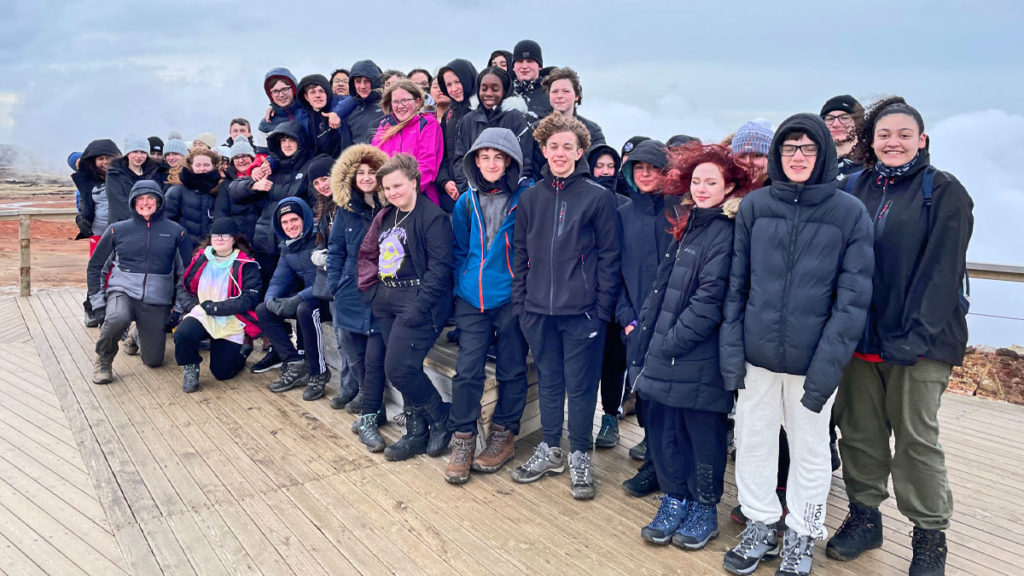 School group on tour in Iceland visiting the Gunnuhver Hot Springs