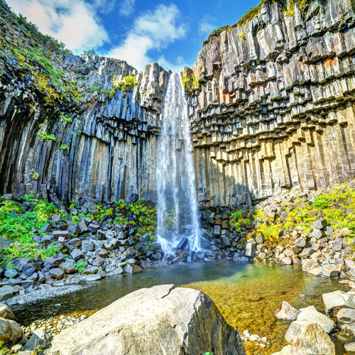 View of famous Svartifoss (Black Fall) in Skaftafell National Park, southeast Iceland