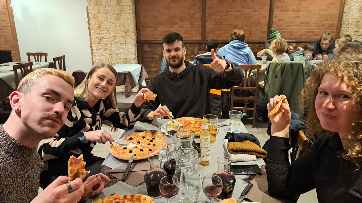 A group of teachers enjoying some much needed food after a day on the slopes in Sestriere, Italy in the February half-term ski season 2023