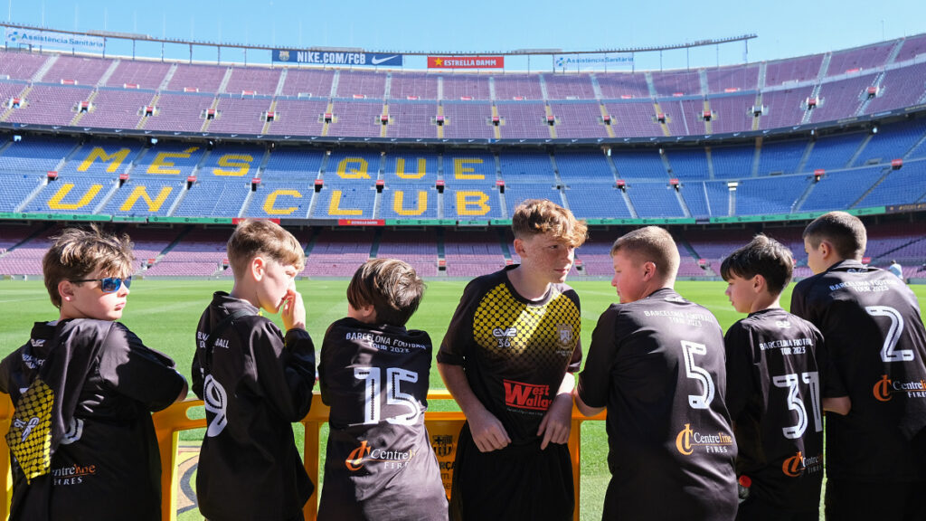students enjoy a pitch side tour of FC Barcelona's Nou Camp stadium