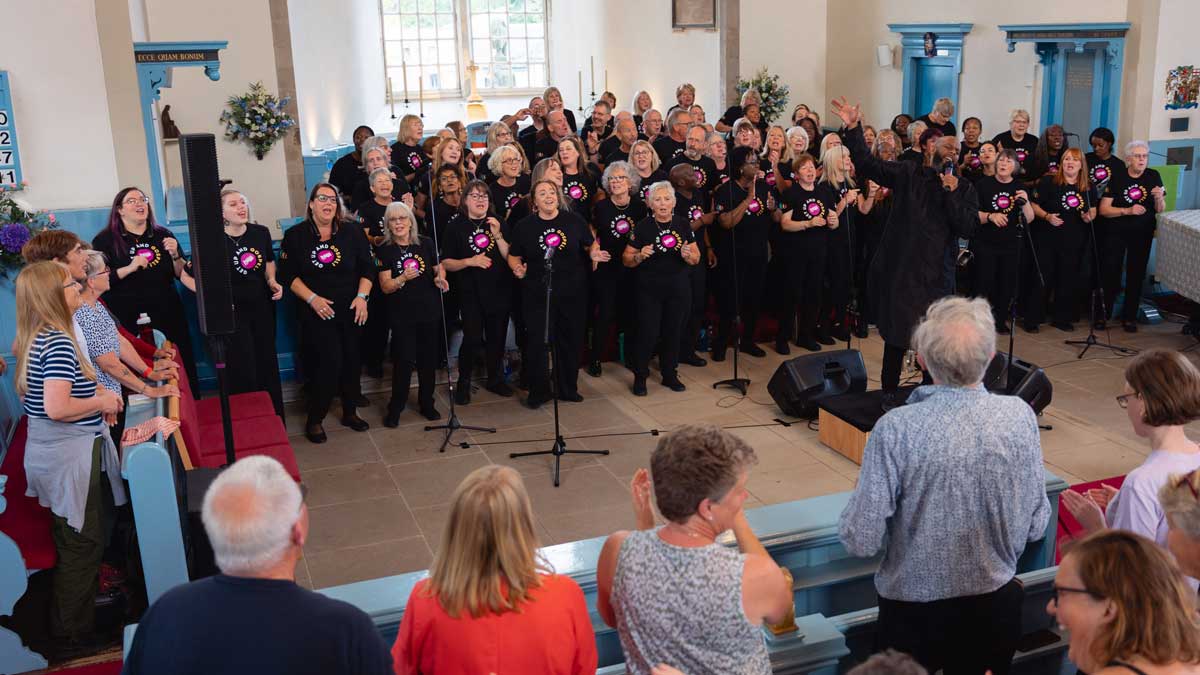 A choir perform to a packed out Canongate Kirk. One of many Edinburgh Fringe venues.