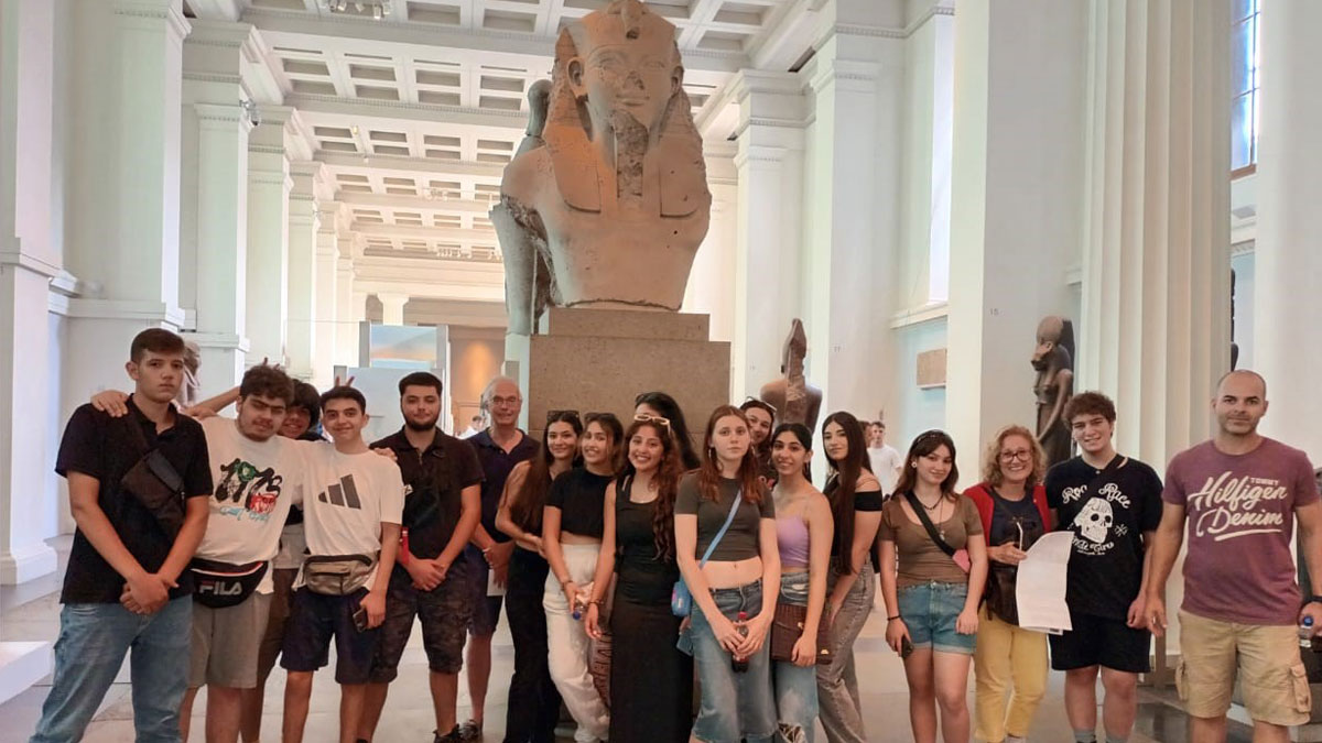 Grammar School Nicosia pupils pose infront of a sphinx stature at a museum in London.