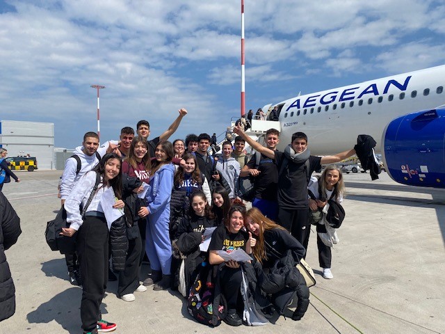 Students from the Grammar School Nicosia pose in Cyprus before they get on the plane.