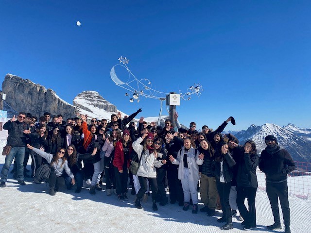 Students pose for a picture outside the Mer de Glace