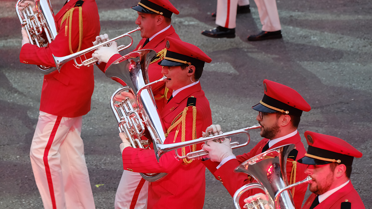 Swiss military marching band brass section perform at the Edinburgh Tattoo.