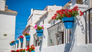 Street with flowers in the Mijas town, Spain.