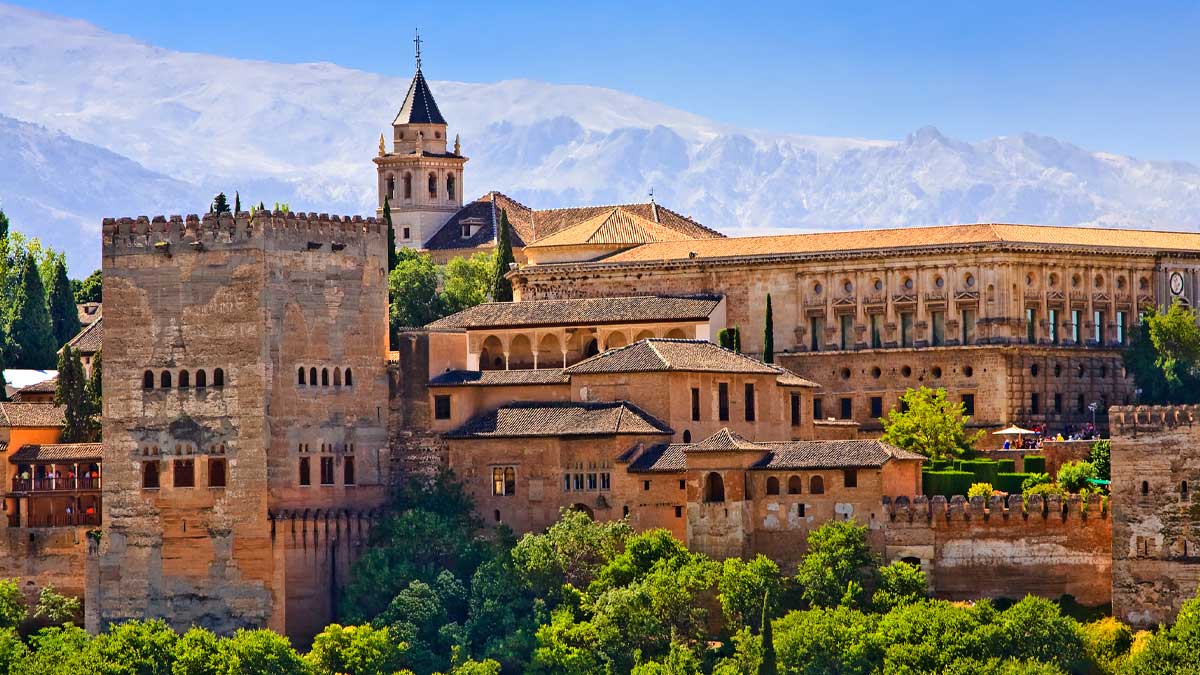 The Alhambra at Granada with the Sierra Nevada mountain range in the background