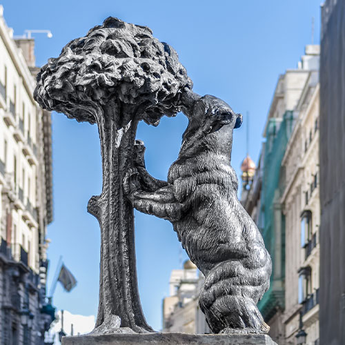 Statue of the Bear and the Strawberry Tree (Oso y el Madrono), sculpture which represents the heraldic arms of the city, installed on Puerta del Sol Square in Madrid, Spain.