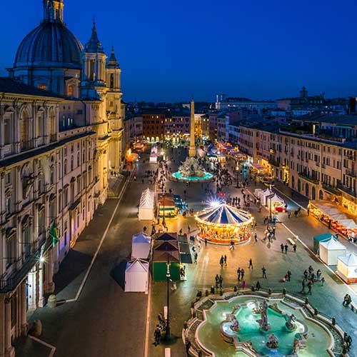 Piazza Navona is a square in Rome, Italy. It is built on the site of the Stadium of Domitian, built in the 1st century AD, and follows the form of the open space of the stadium.