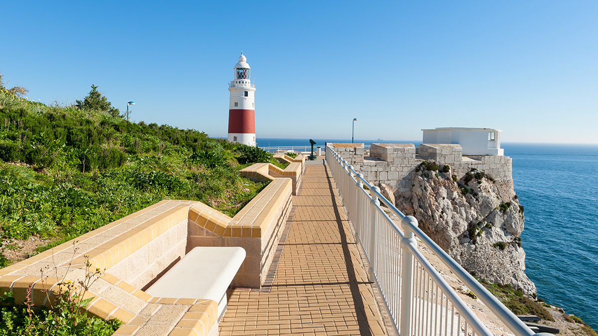 Europa Point lighthouse on a promenade in Gibraltar