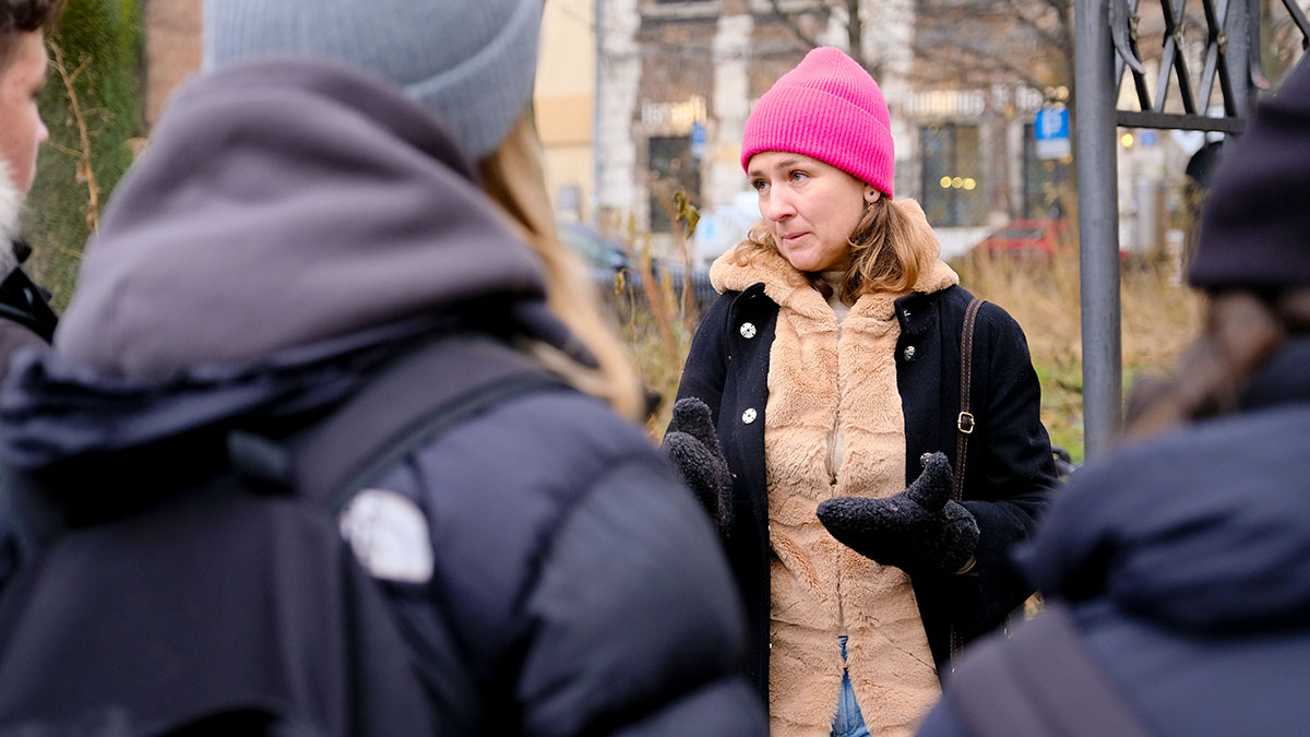 School group on a walking tour of Krakow with a tour guide