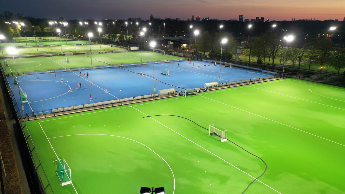 6 Hockey pitches with flood lights on at SV Kampong