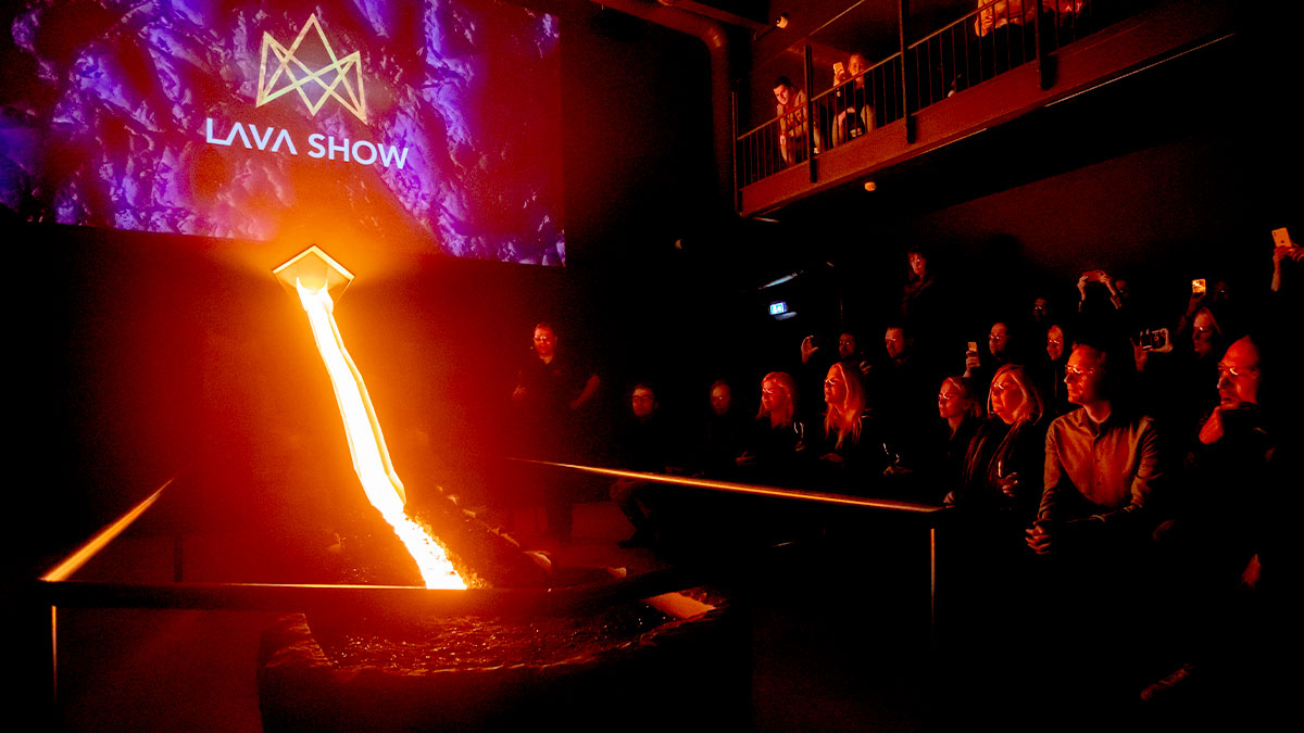 Lava show with running lava glowing and audience watching