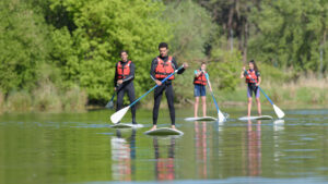 Stand up paddle boarding on a river