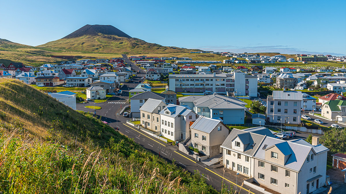 The town of Vestmannaeyjabær with Eldfell in the backdrop, the Westman Islands
