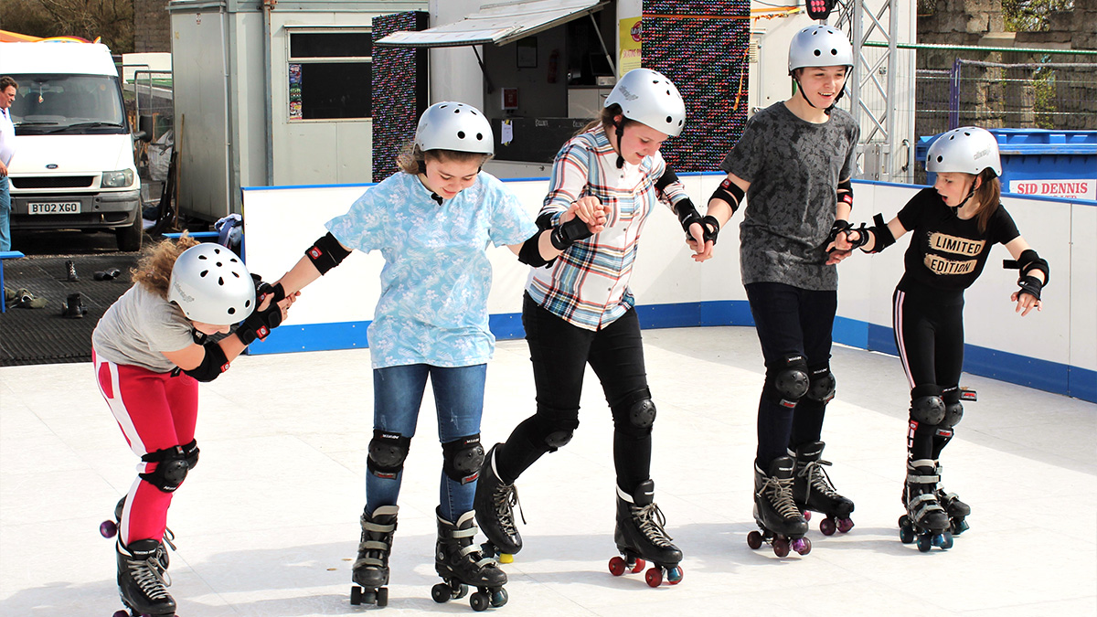 Kids enjoying the roller rink in Skegness