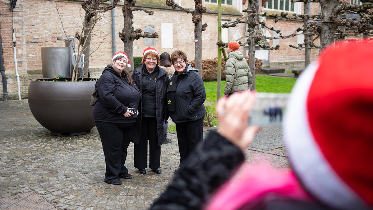 Rock choir members taking a photo in Belgium