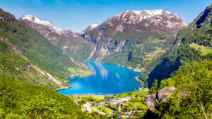 Norwegian Fjord Geiranger Norway. Beautiful Geiranger Fjord, Norway. Norwegian panoramic vista showing landscape and mountains.