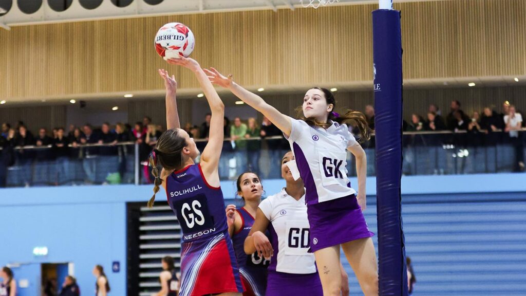 Netball players competing in a tournament
