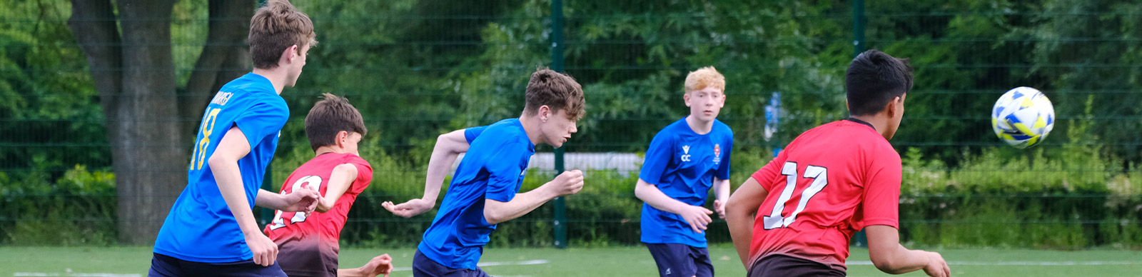 Two football teams compete at a tournament