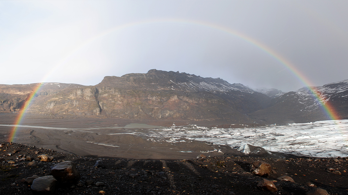 picture of a rainbow over Solheimajokull
